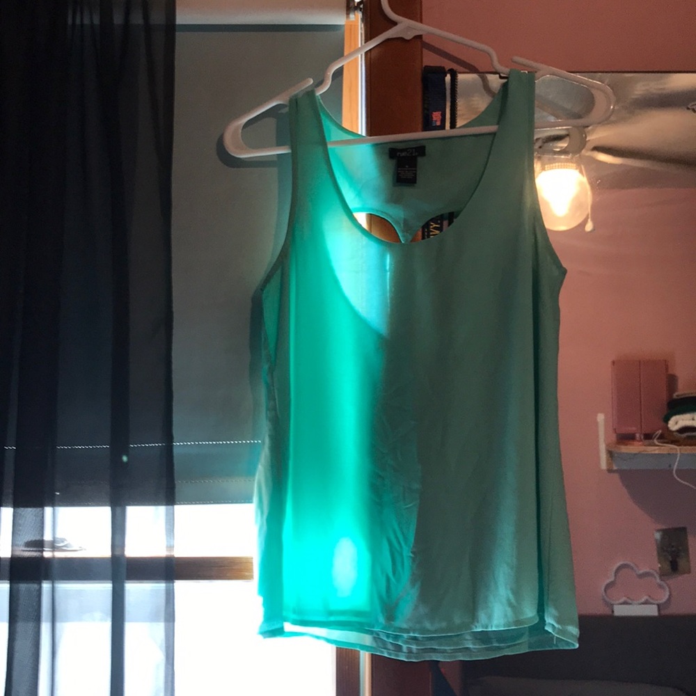 teal rue21 tank top with heart cutout on back